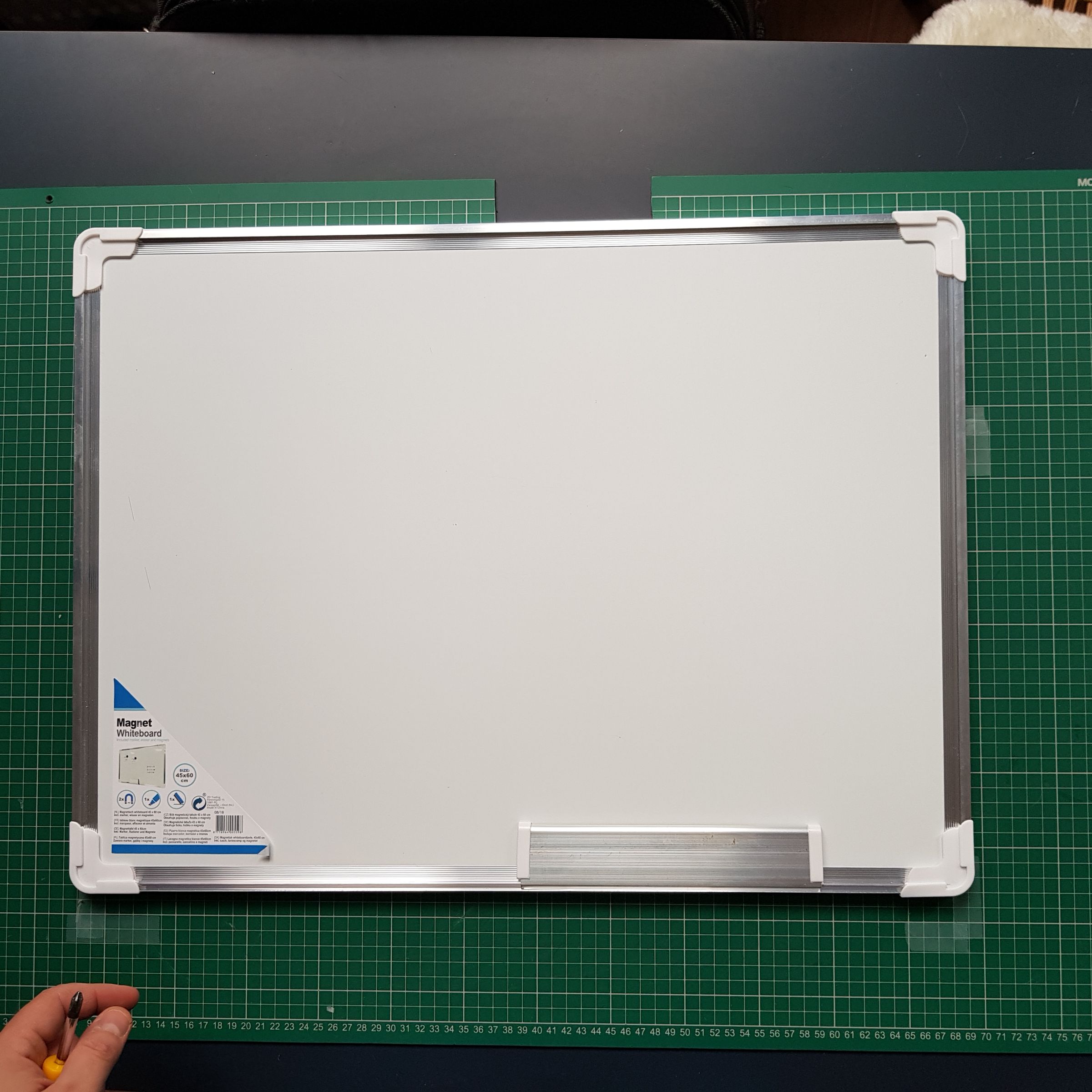 01 - Remove the sides from the magnetic board 01.jpg
