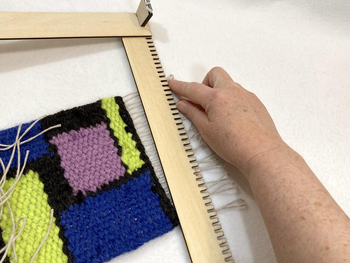 14-1 Getting off the loom.JPG
