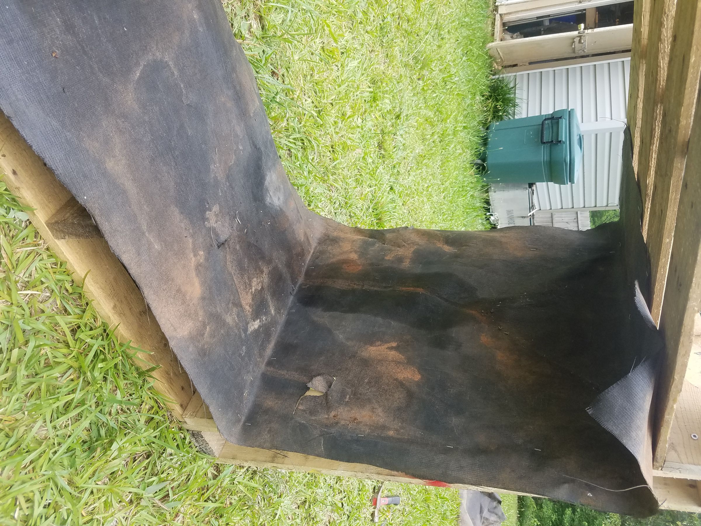 20160604_165931 Tacking Landscape Fabric 2nd Side.jpg
