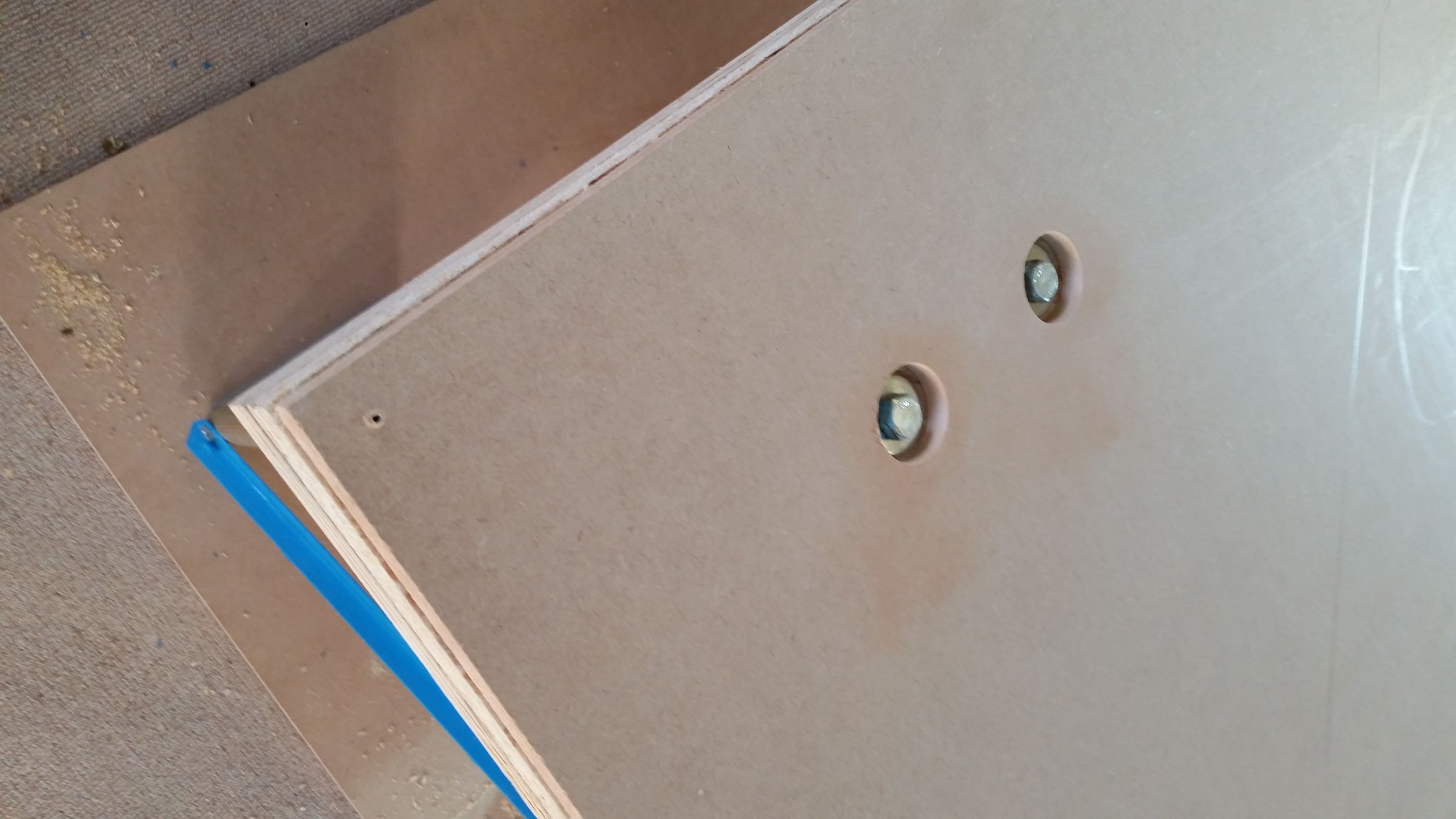 Bolt heads and washers recessed in holes.jpg