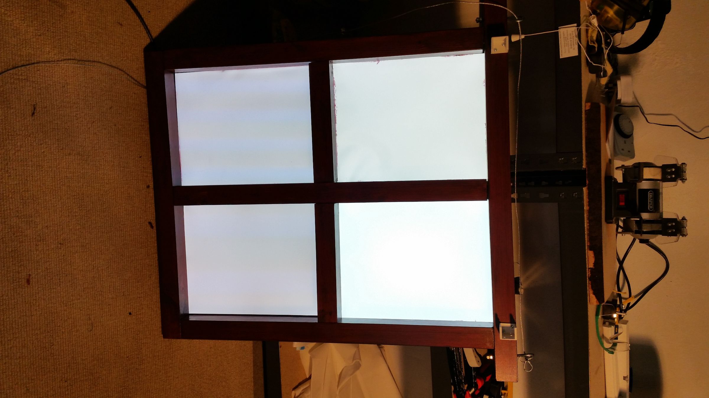 Mounted venetian blind holders on finished windowframe.jpg