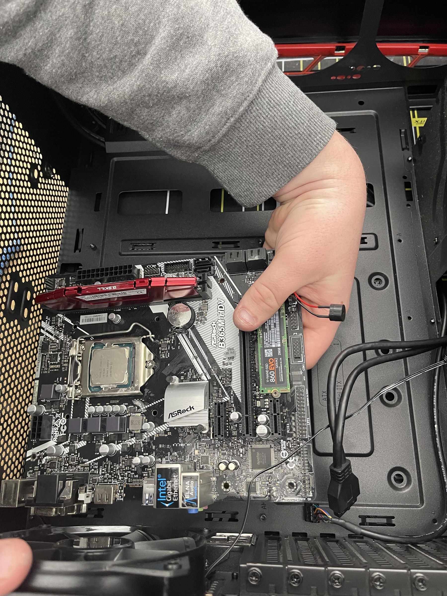 Placing MB In Case.jpeg