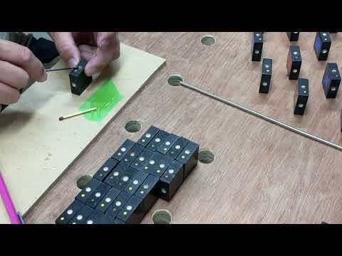 Qwirkle magnet upgrade, glueing in the magnets.