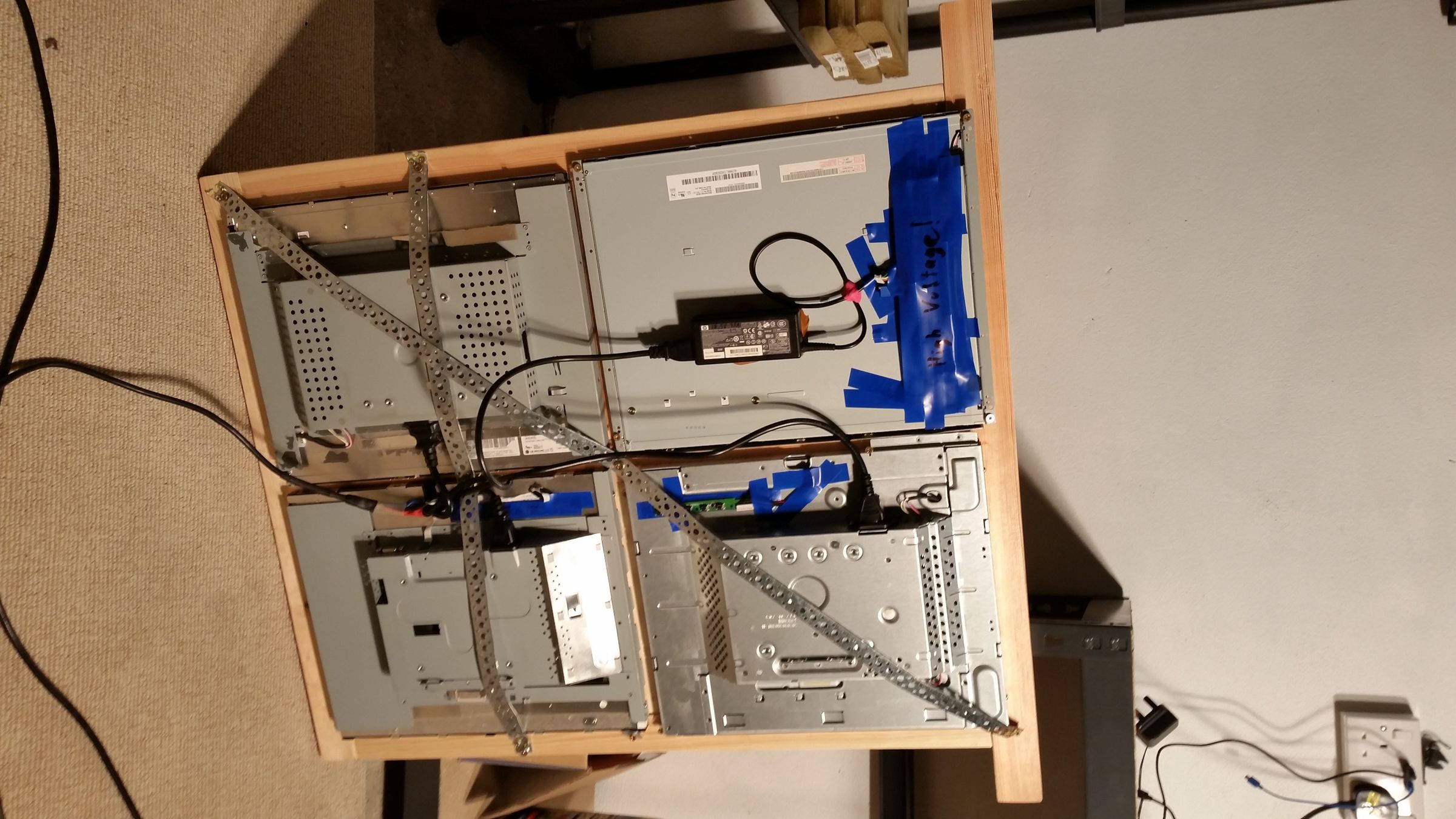Screens mounted with steel strap and wood screws.jpg