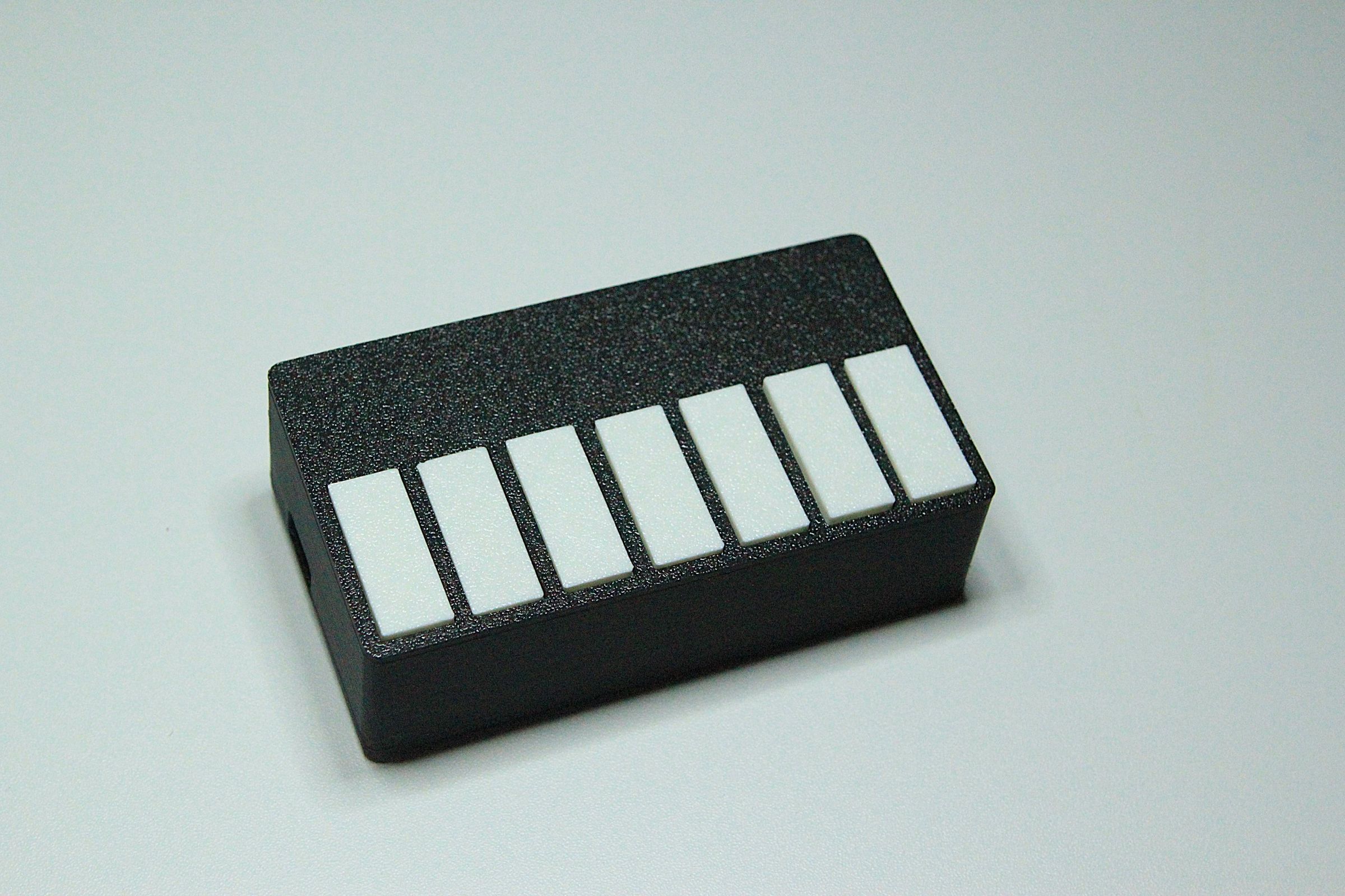 Side pose of Mini Piano.JPG