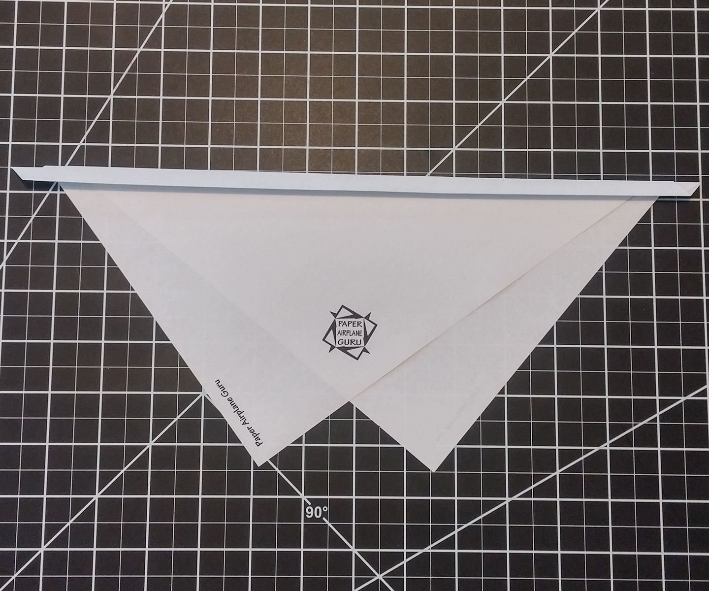 XOPaperAirplane_Step4_ThirdFold.jpg