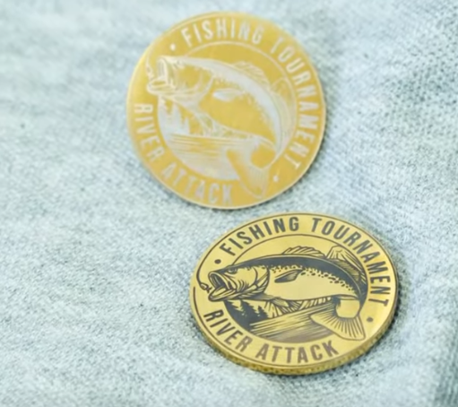 brass fishing souvenir pins.png