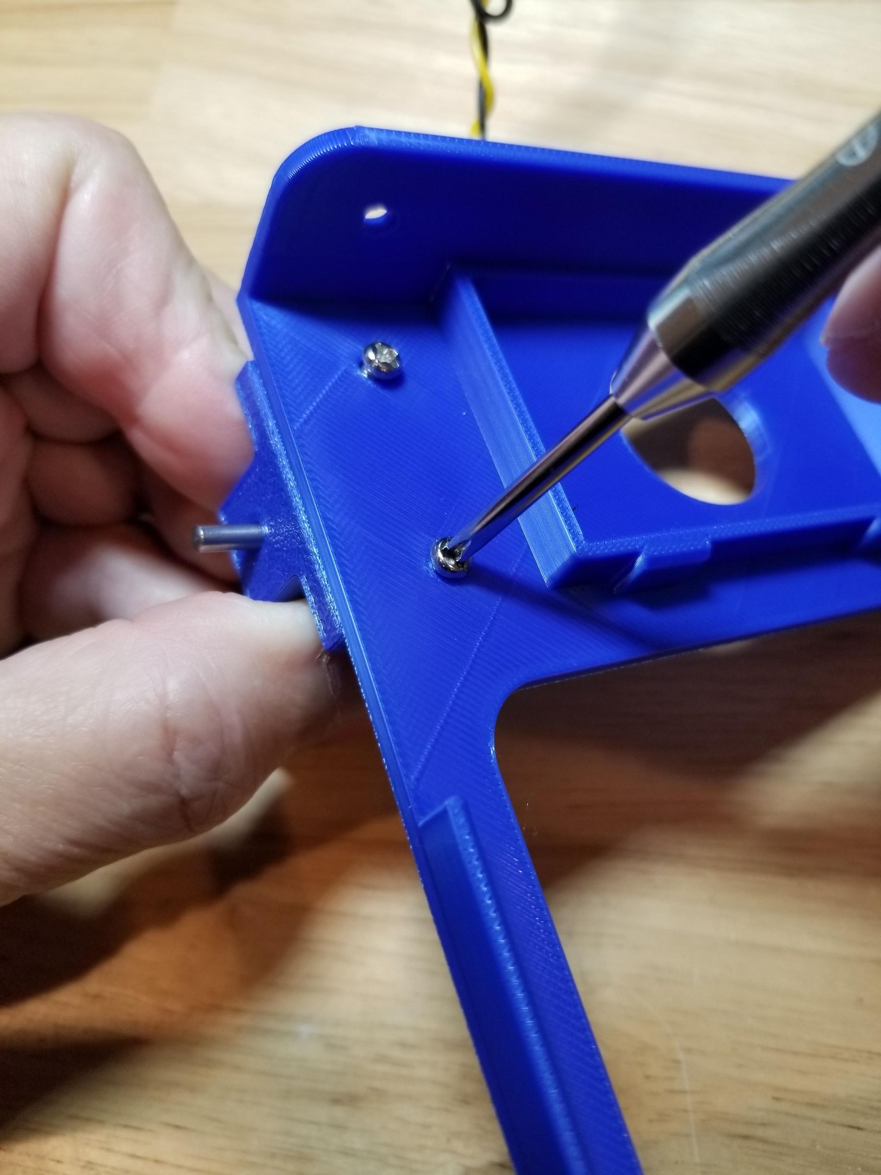 fasten motor holder to chassis.jpg