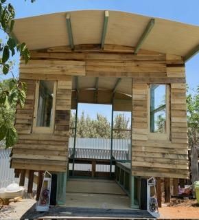 pallet cladding on the front.jpeg
