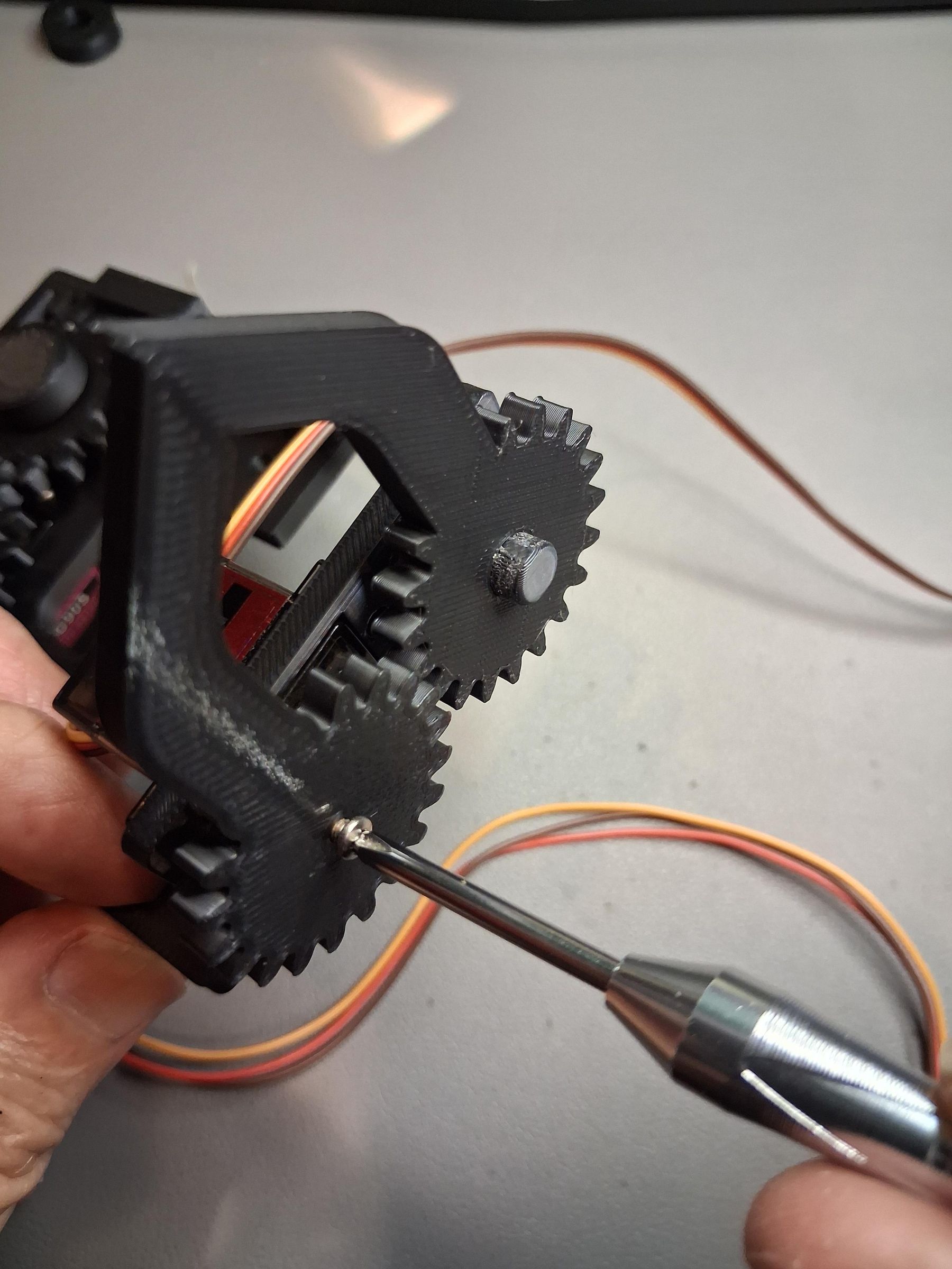 screw on gripper driving gear.jpg