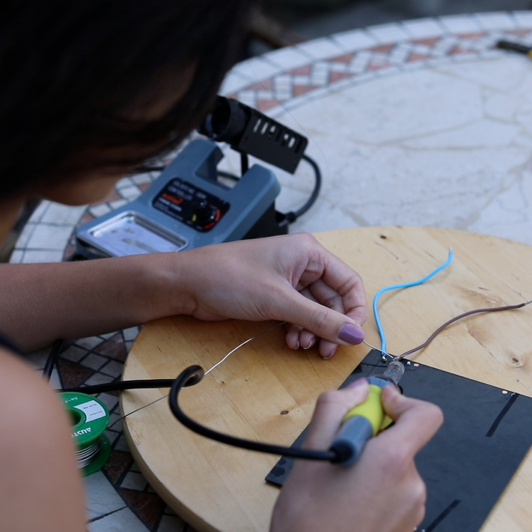 step_1_solder_wires_onto_panel.png