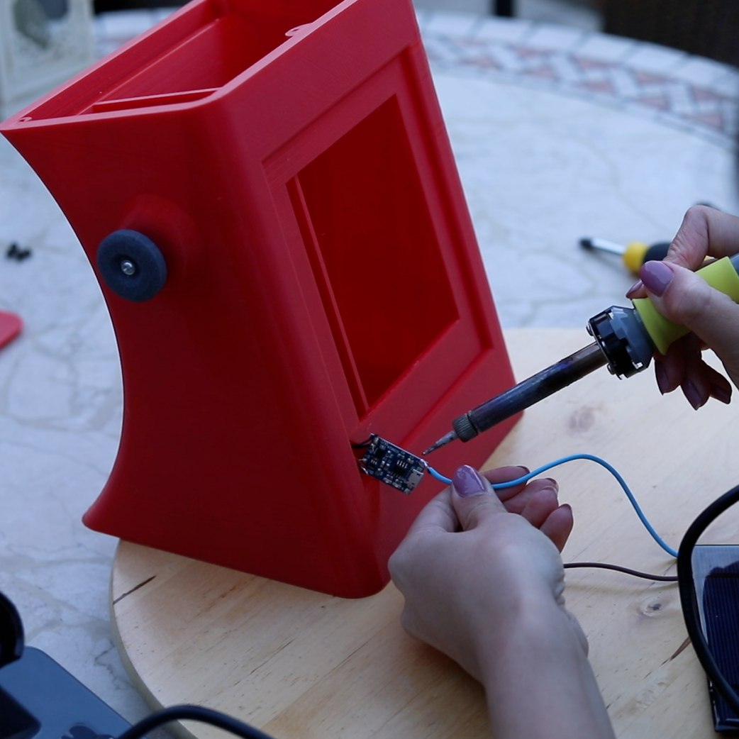 step_8_solder_solar_wires_to_charge_controller_input.png