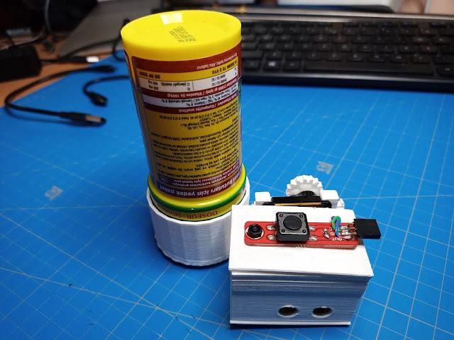Automatic Dispenser for Feeding Fish Twice a Day, With a Push Button to Dispense the Food on Demand