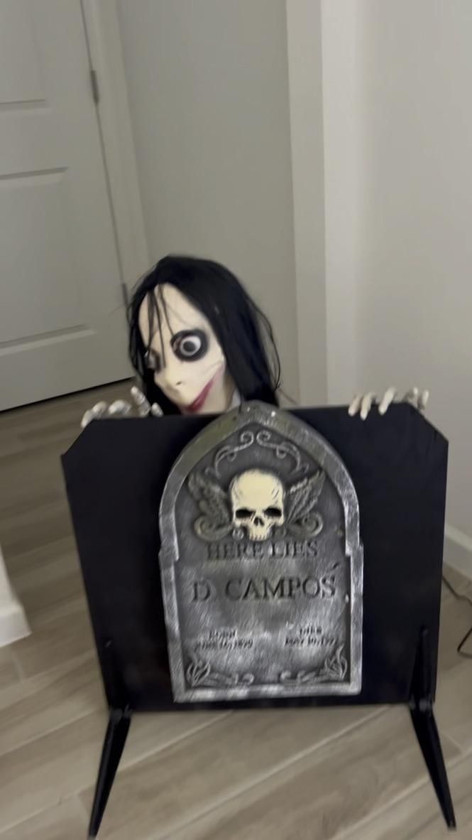 Ms D. Campos - Outdoor Tombstone Popper