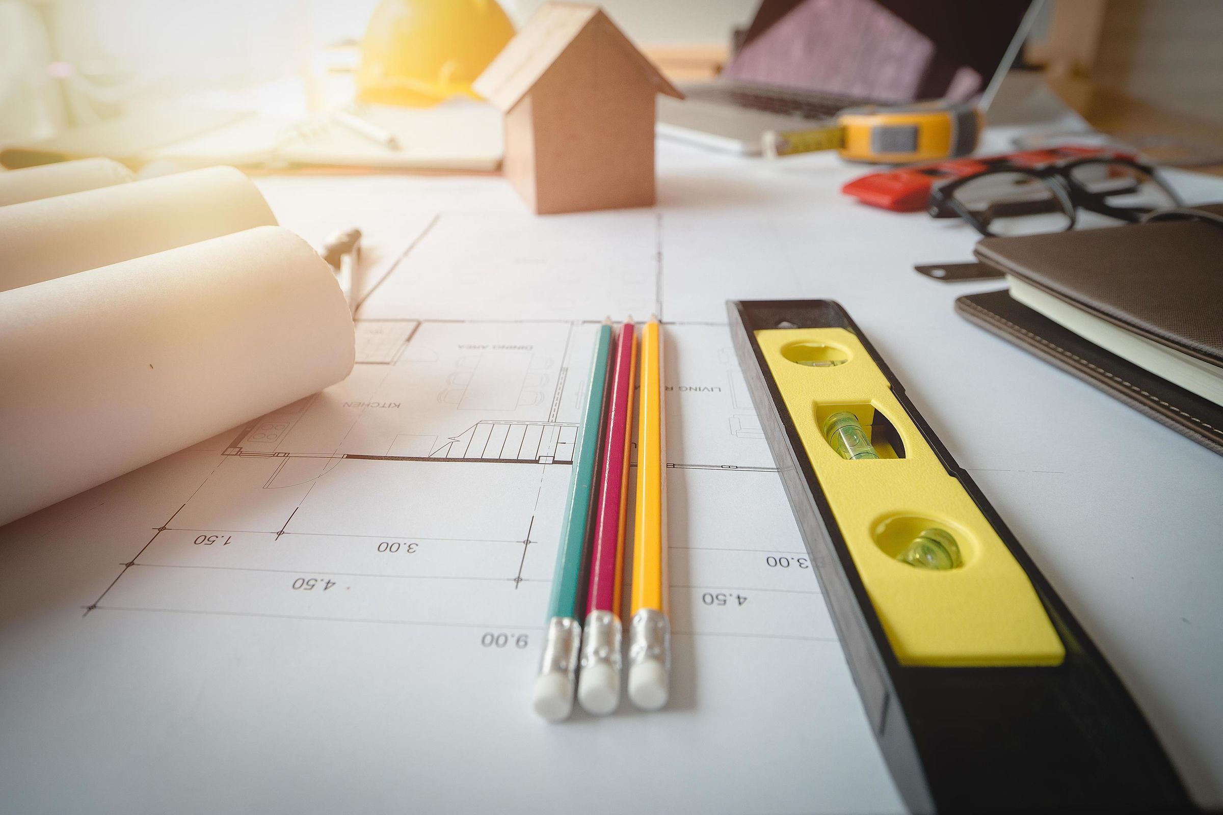 architectural-plans-work-apace-architectural-project-blueprints-pencil-labtop-and-divider-compass-on-wooden-desk-table-construction-background-engineering-tools-copy-space-archit.jpg