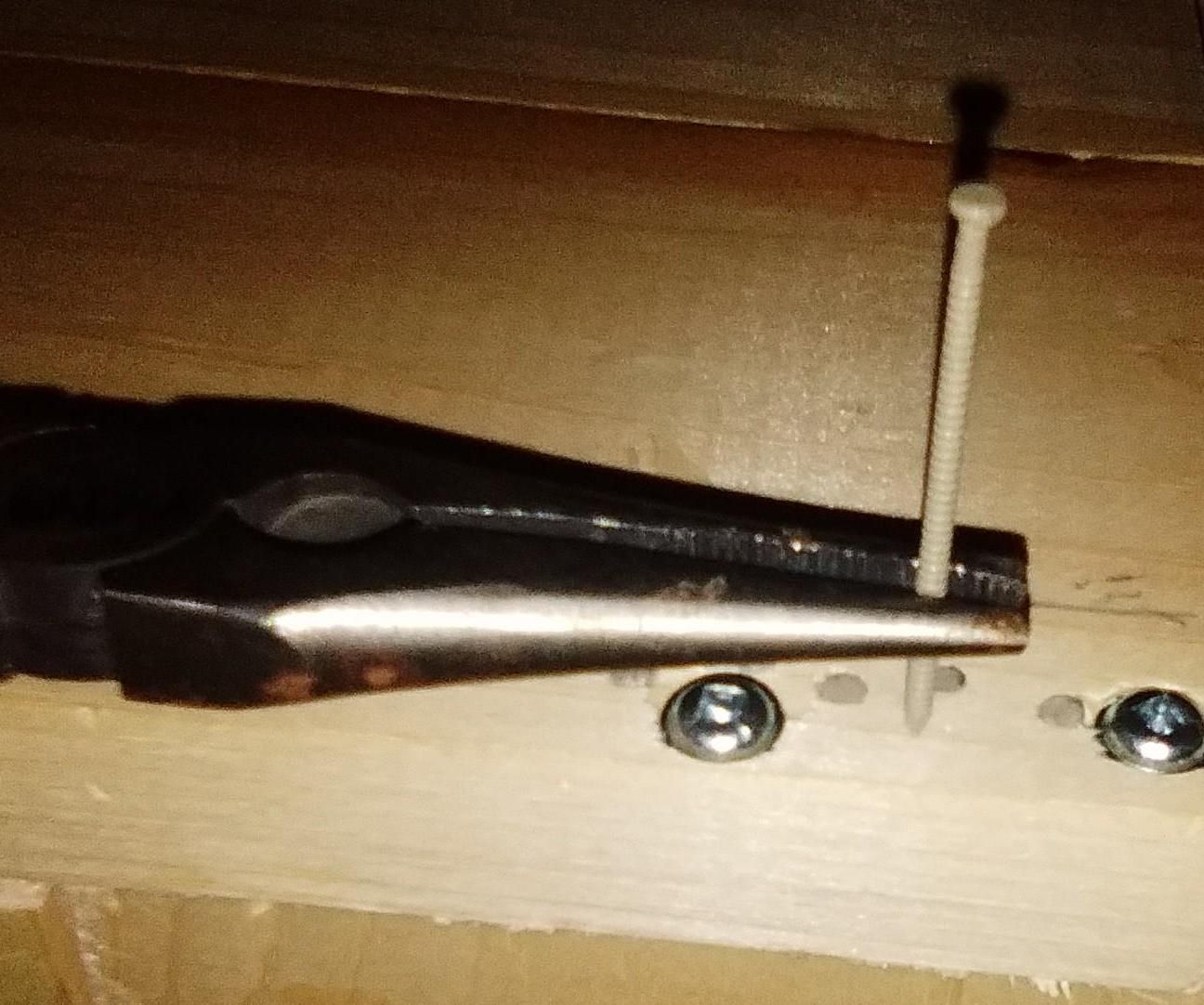 How to Hold a Nail So That You Do Not Crush Your Finger While Hammering