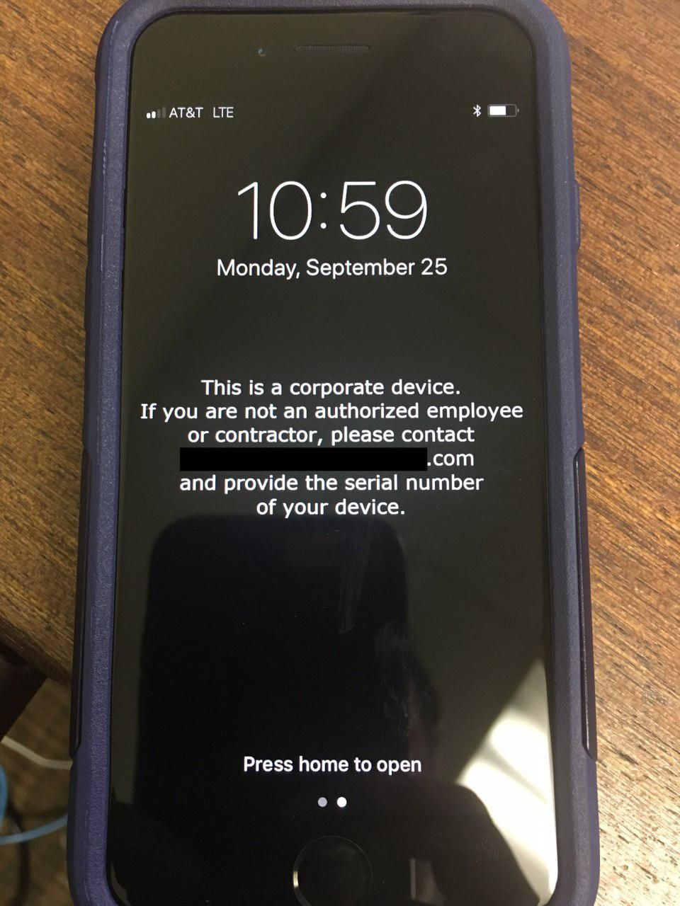 this is a corporate device. if you are not an authorized employee or contractor, please contact and provide the serial number of your device.jpg