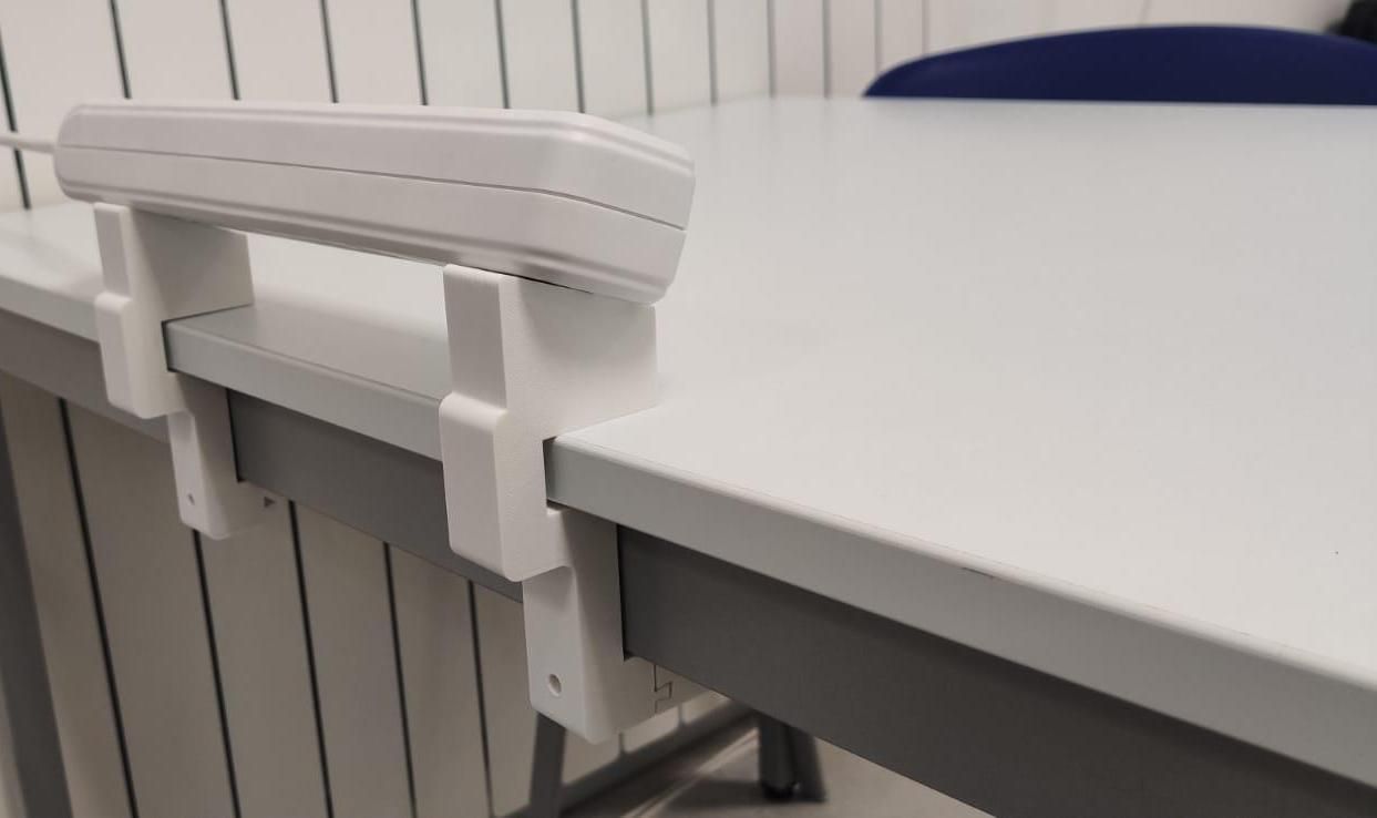 SOPORTE PARA REGLETA DE ENCHFE