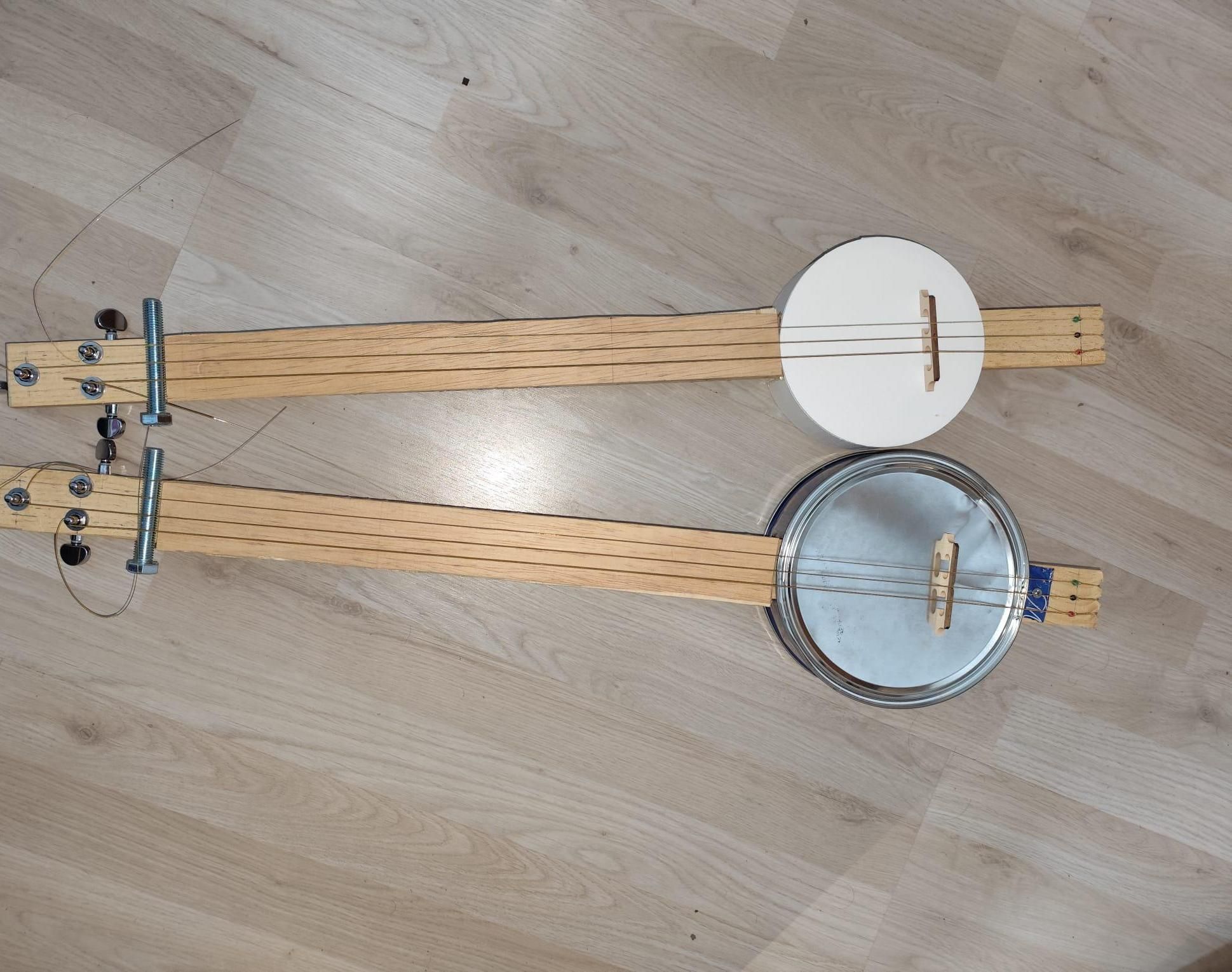Cookie Tin Banjo and 3D Printed Banjo