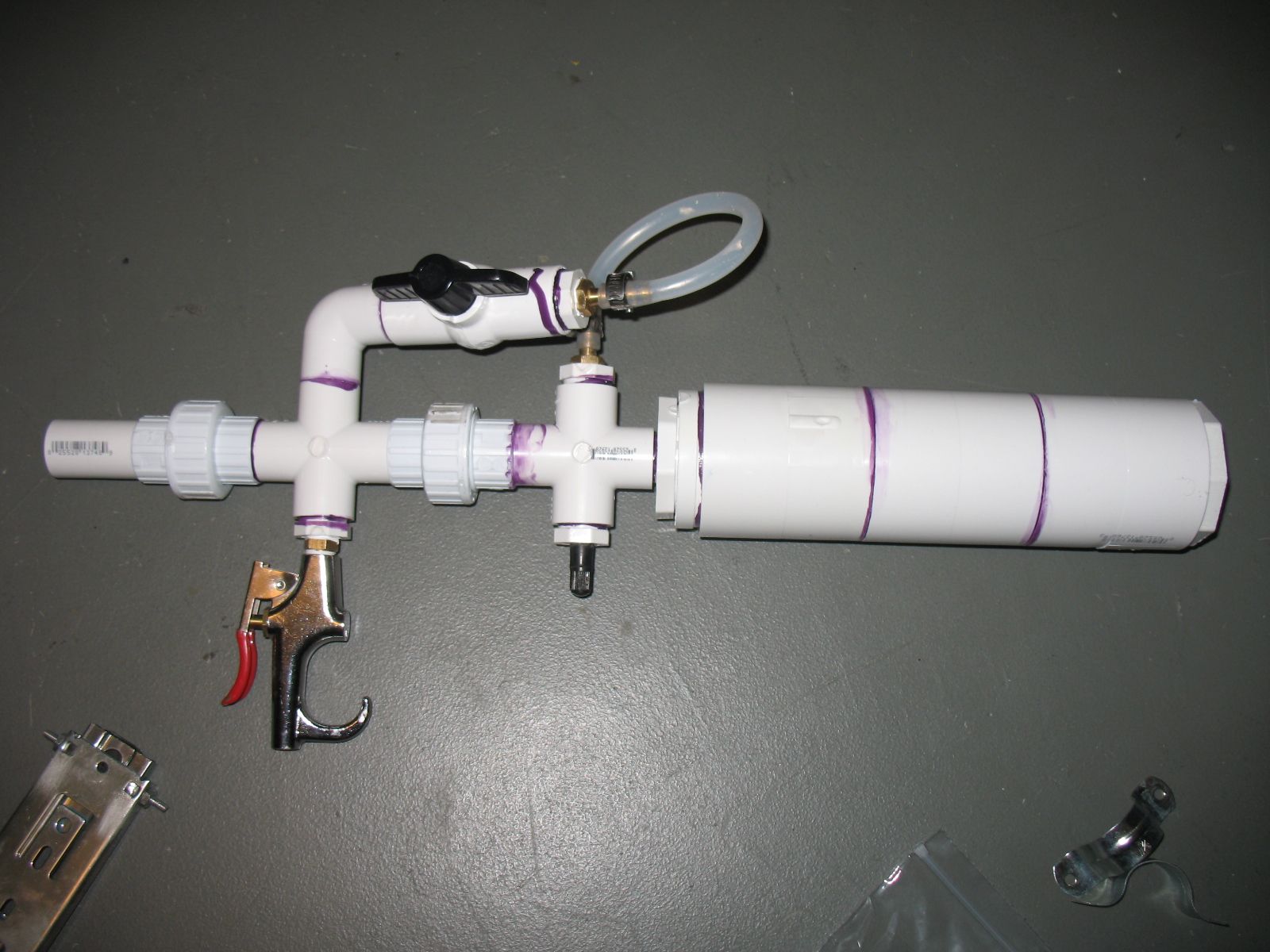 Cascade Failure Triggered Double Burst Disk Pneumatic Airgun