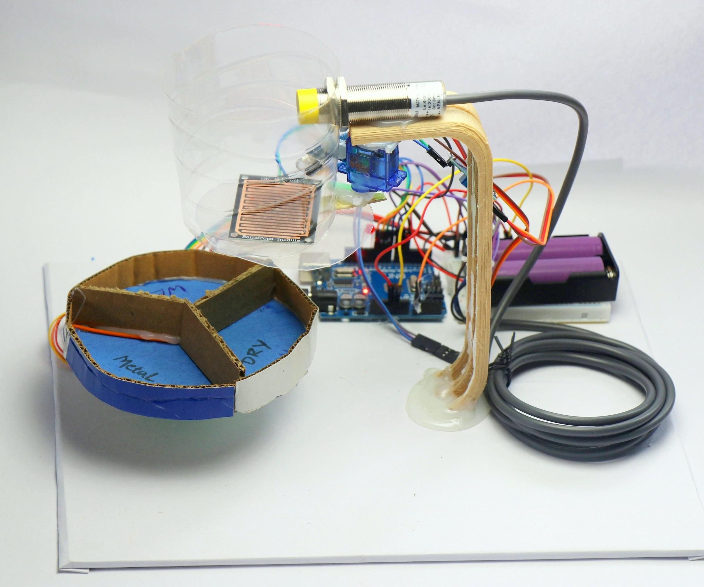 Automatic Dry Wet and Metal Waste Segregation Project Using Arduino