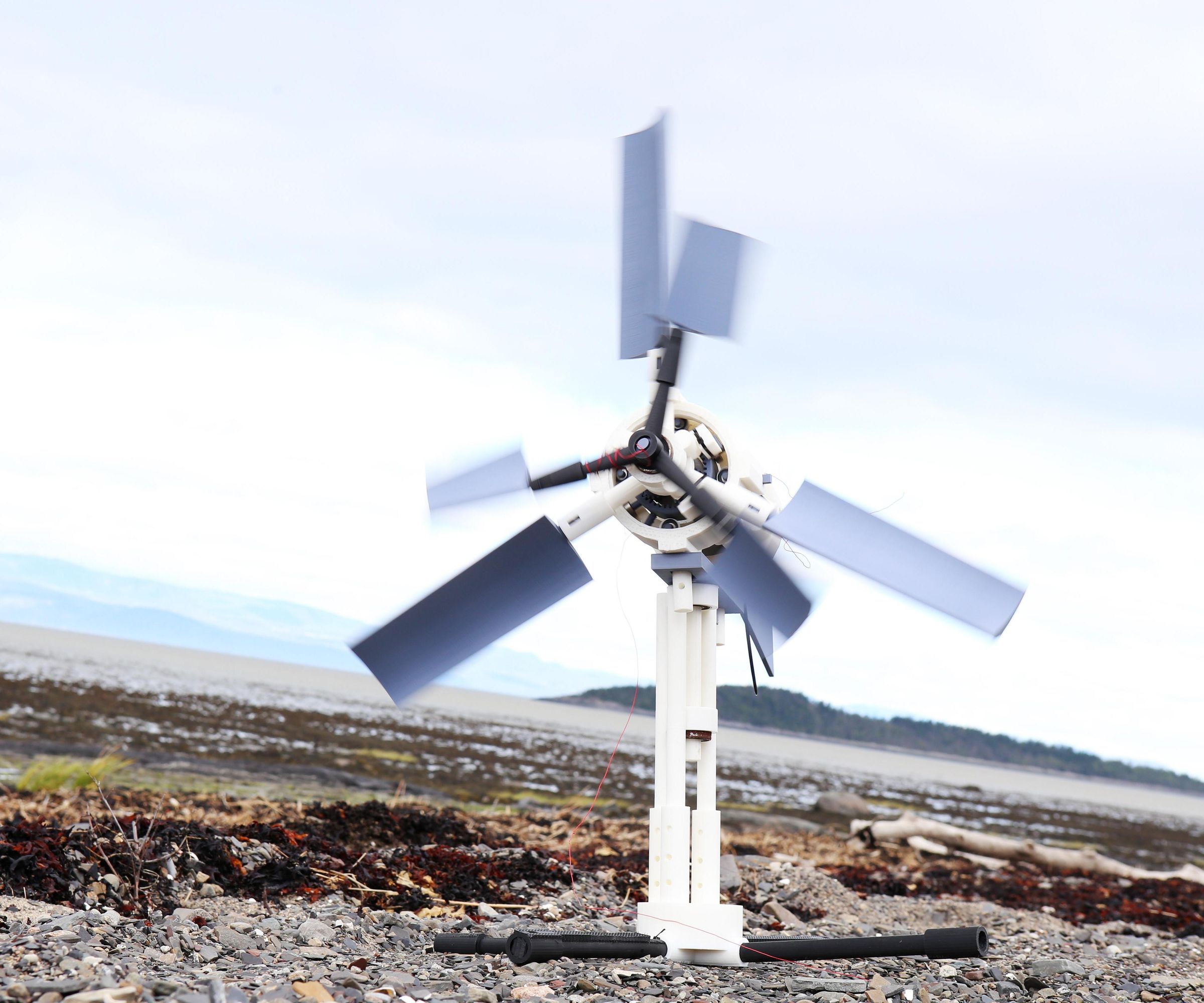 Bi-Generator Vertical Wind Turbine Device