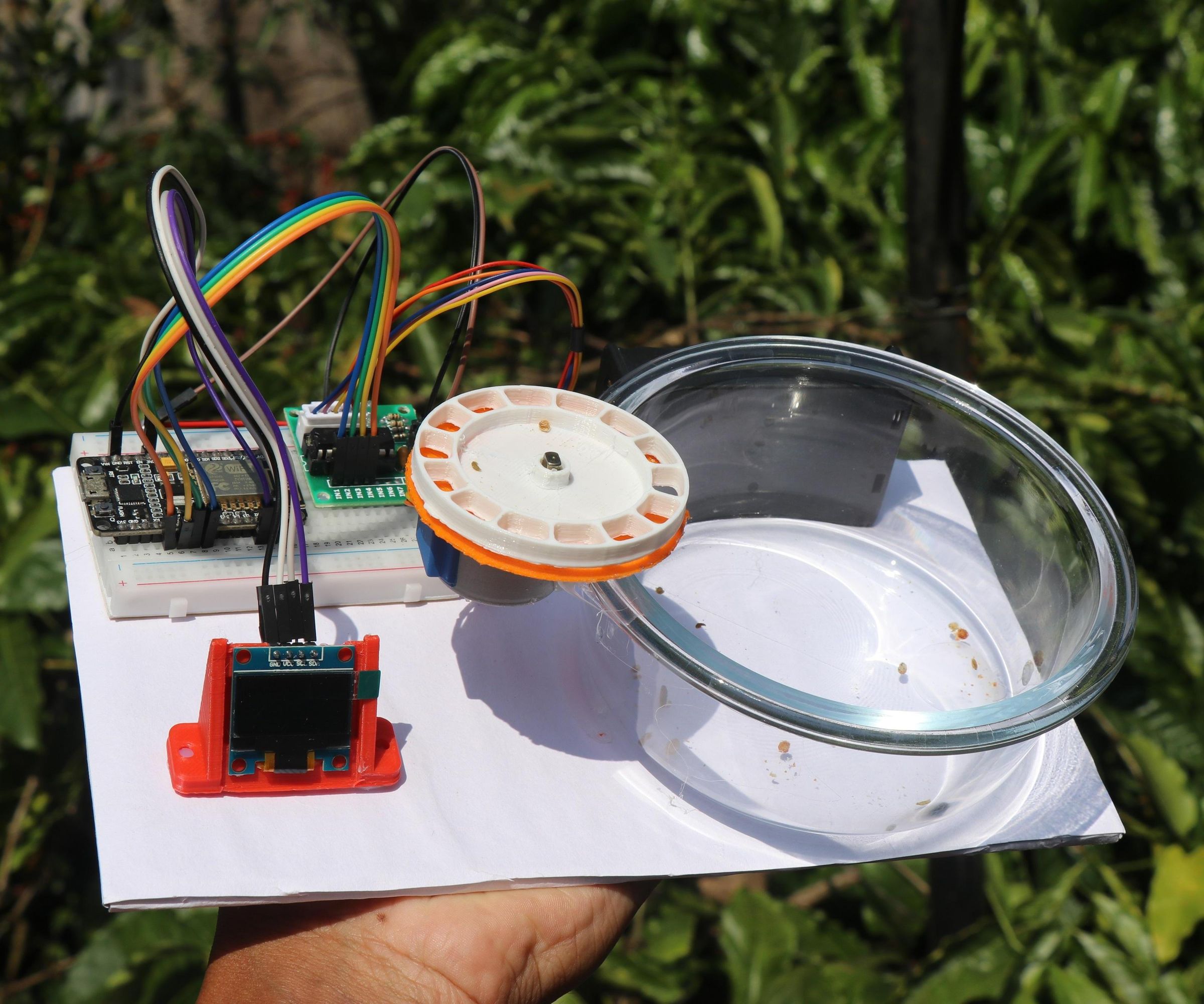 Fish Food Dispenser Using 3d Printed Parts Controlled With Wi-Fi and a Phone