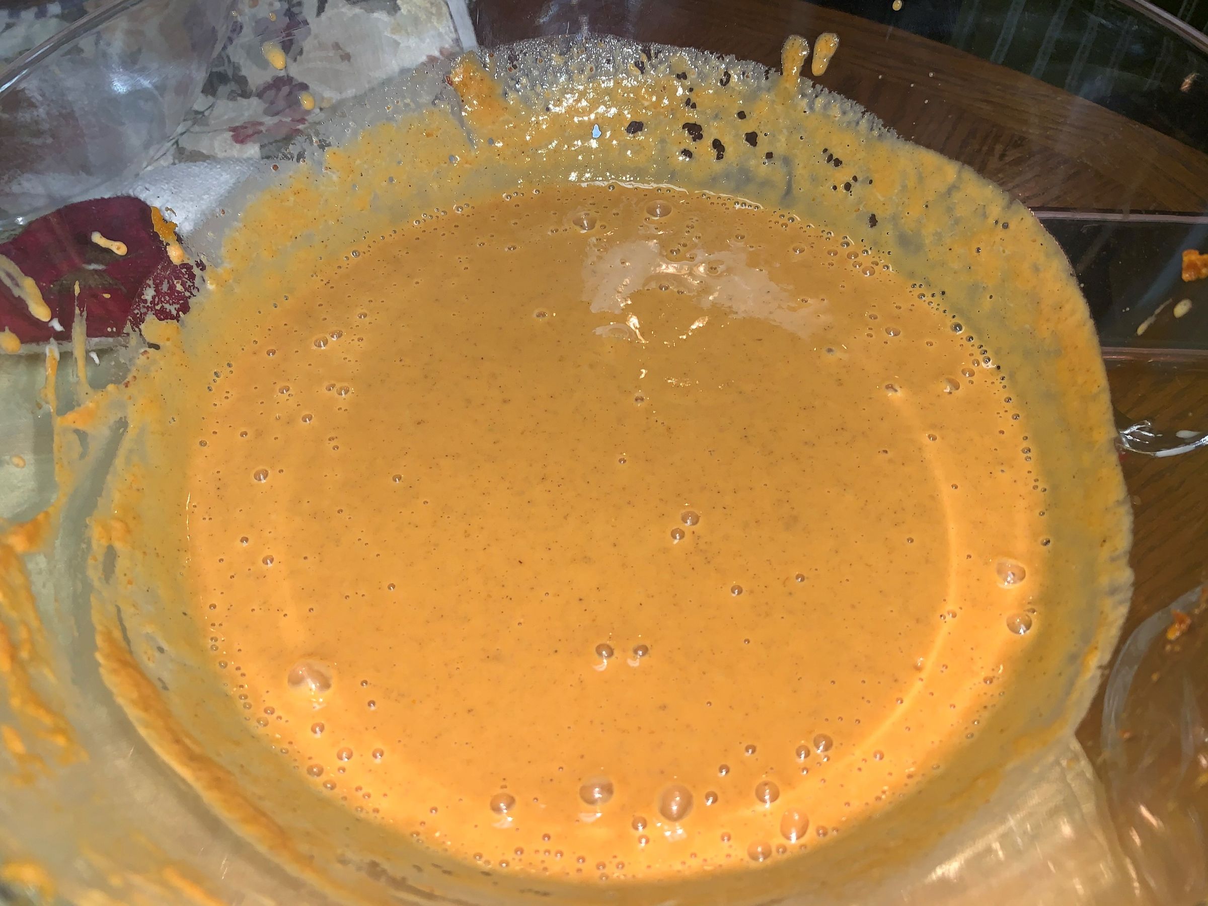 step 12 mix all dry ingredients into a large bowl while gradually pouring in the carnation milk and Libby's pure pumpkin.jpg