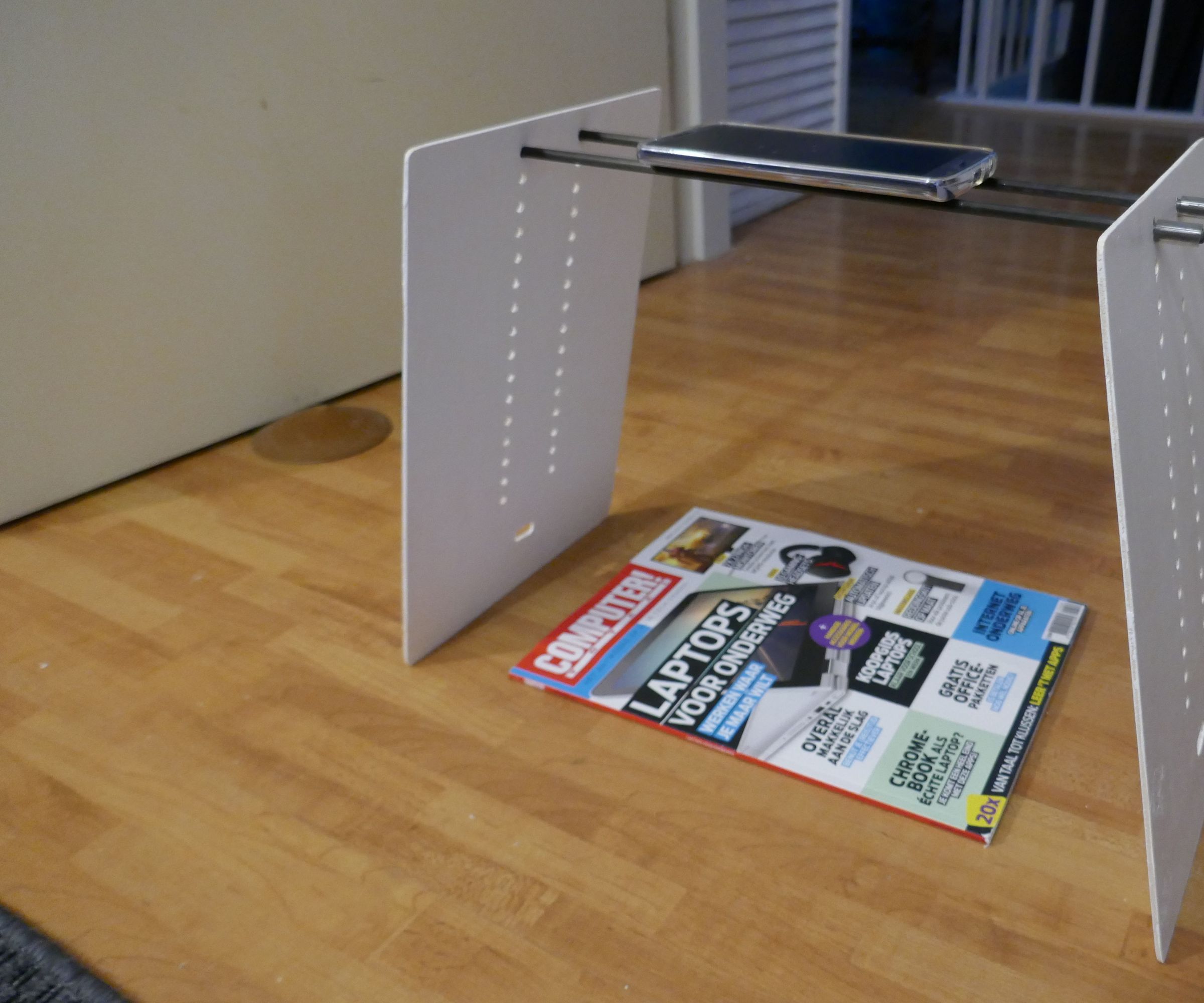 A Simple Ultralight Variable Height Mobile Phone Copy Stand  for Photocopying While Traveling