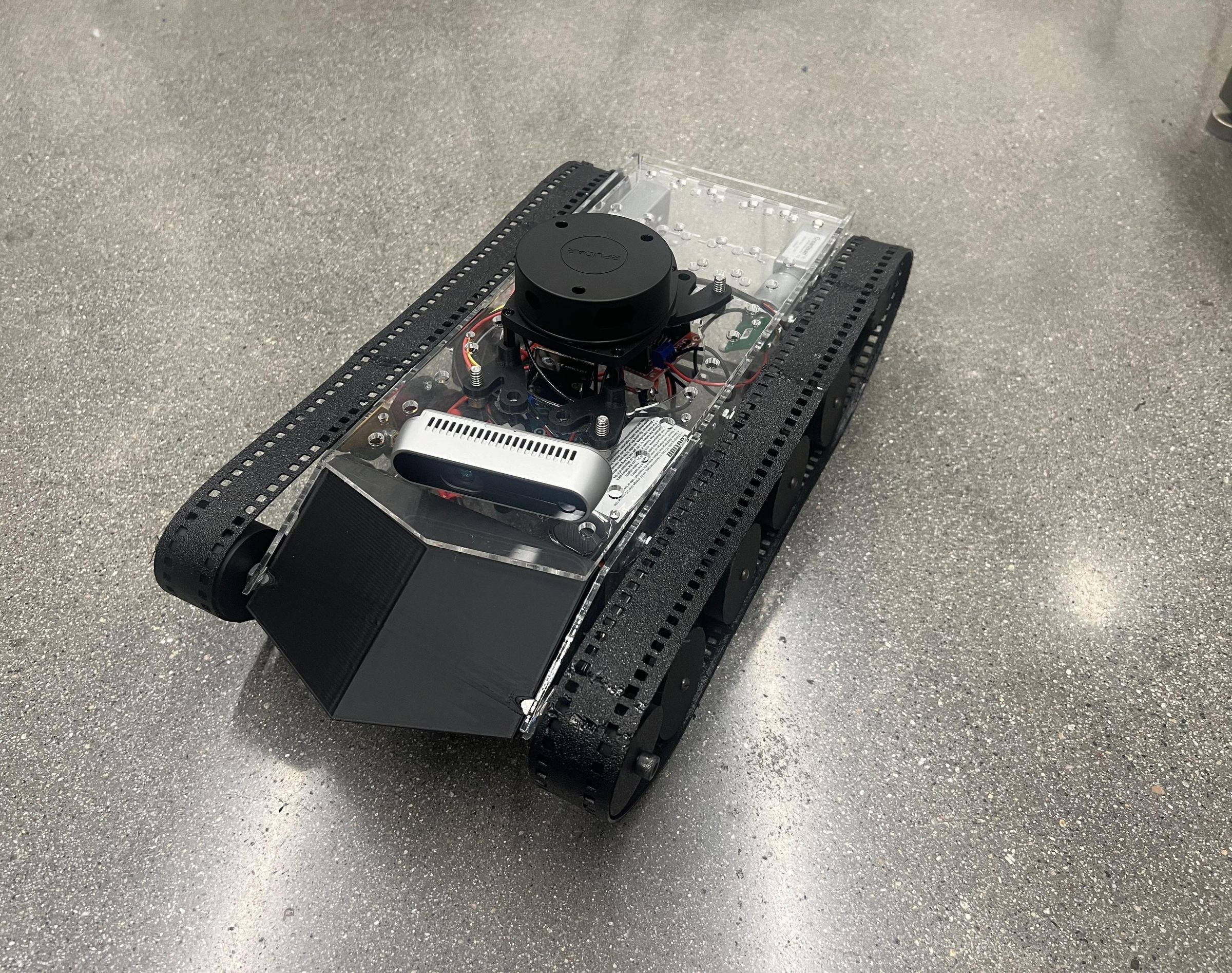 Remote Controlled Tracked Vehicle With Obstacle Avoidance