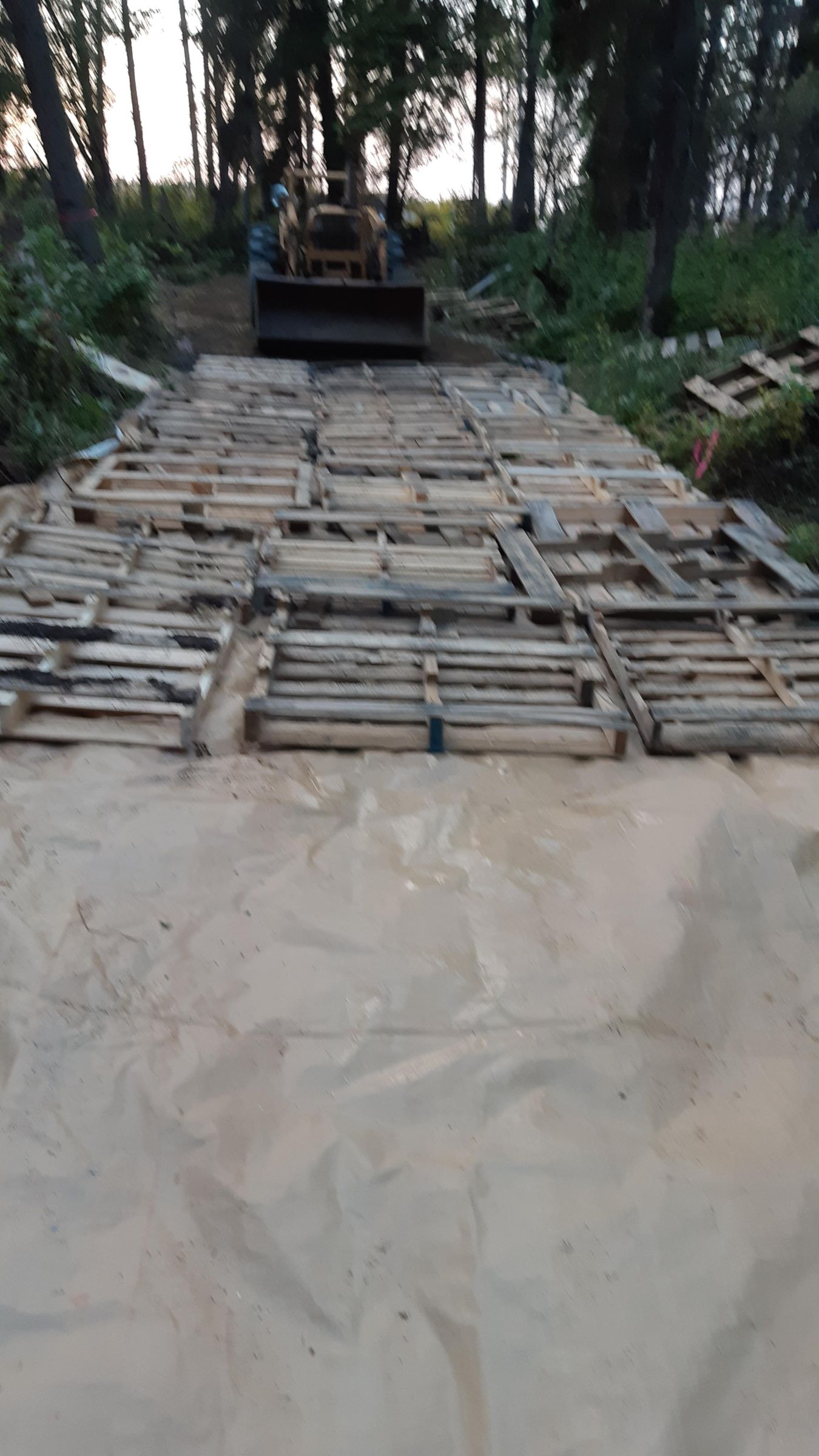 Inexpensive Pallet Road and Parking Area in Muskeg