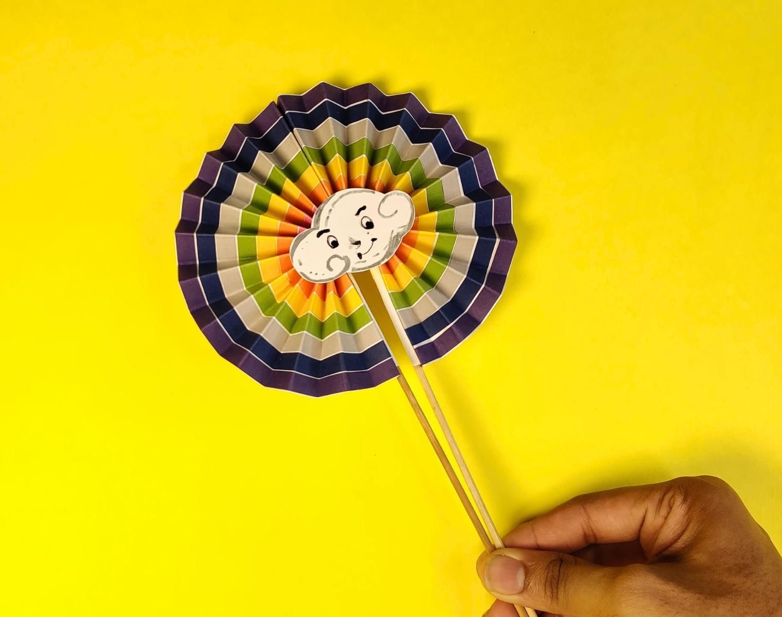 Cheerful Rainbow Fan With a Cute Cloud Face