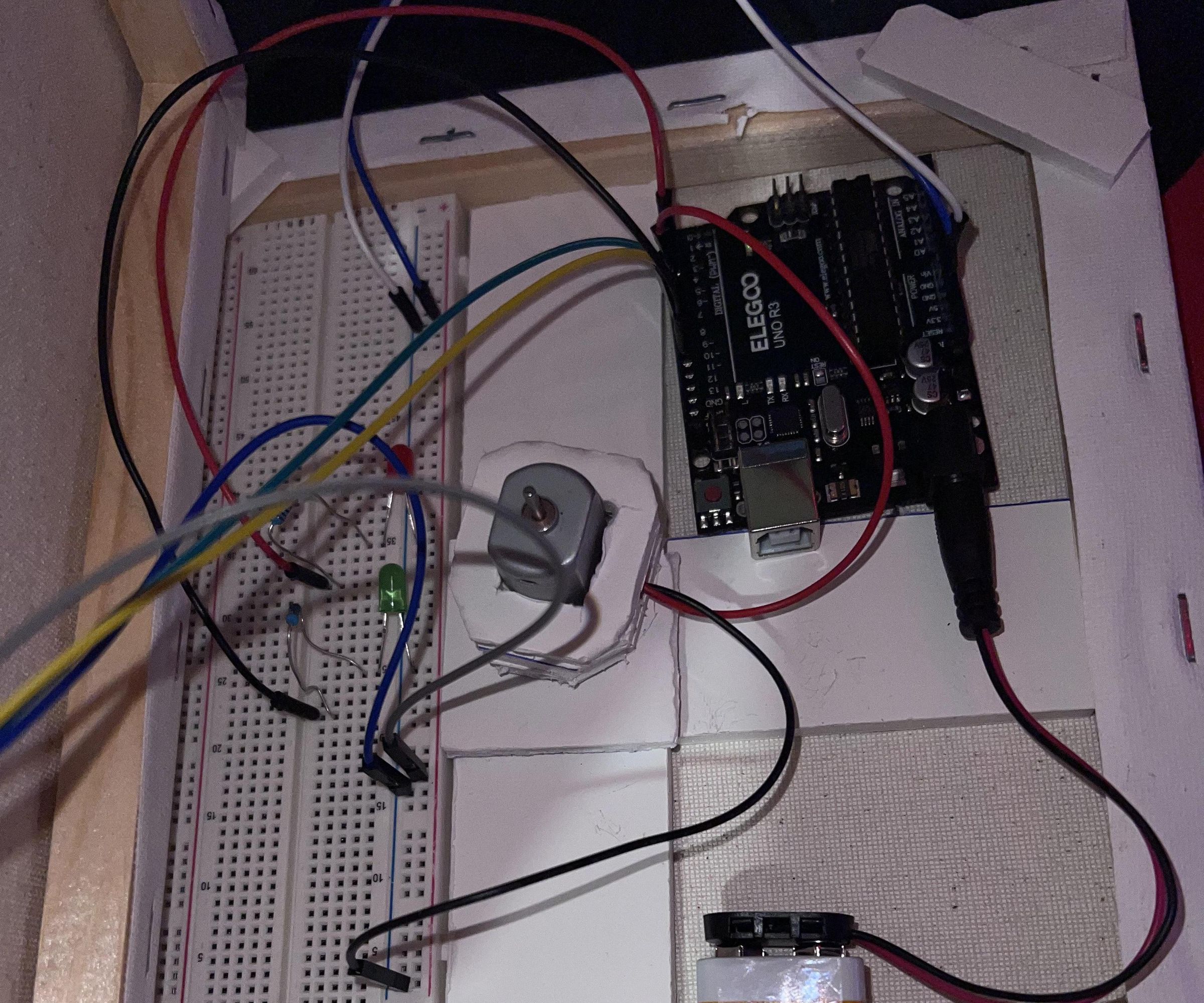 Controlling DC Motor With an Ultrasonic Sensor With Conformation LEDs