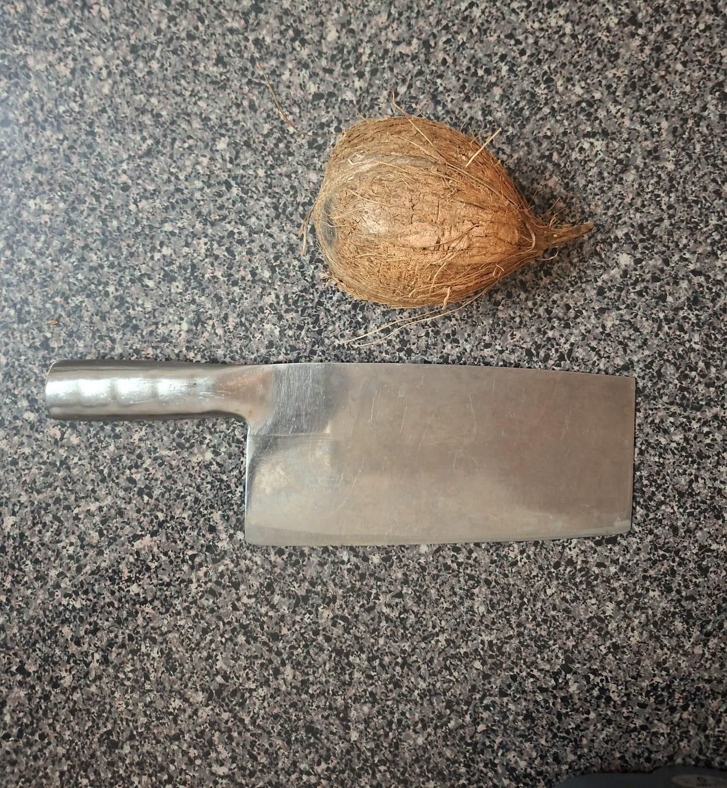 How to Open a Coconut at Home