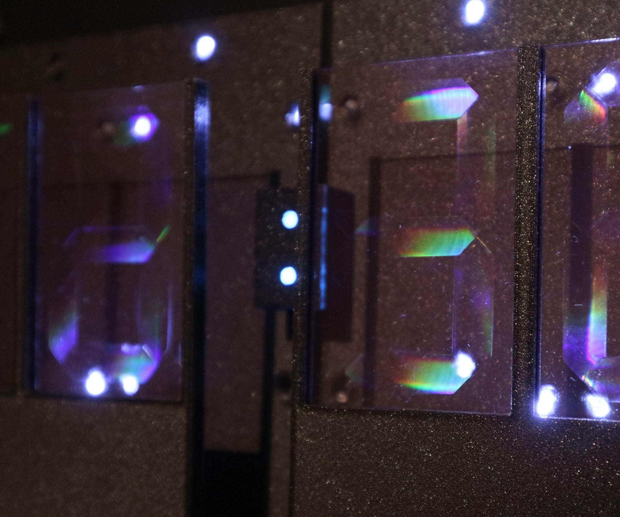 Holographic 7-Segment Clock