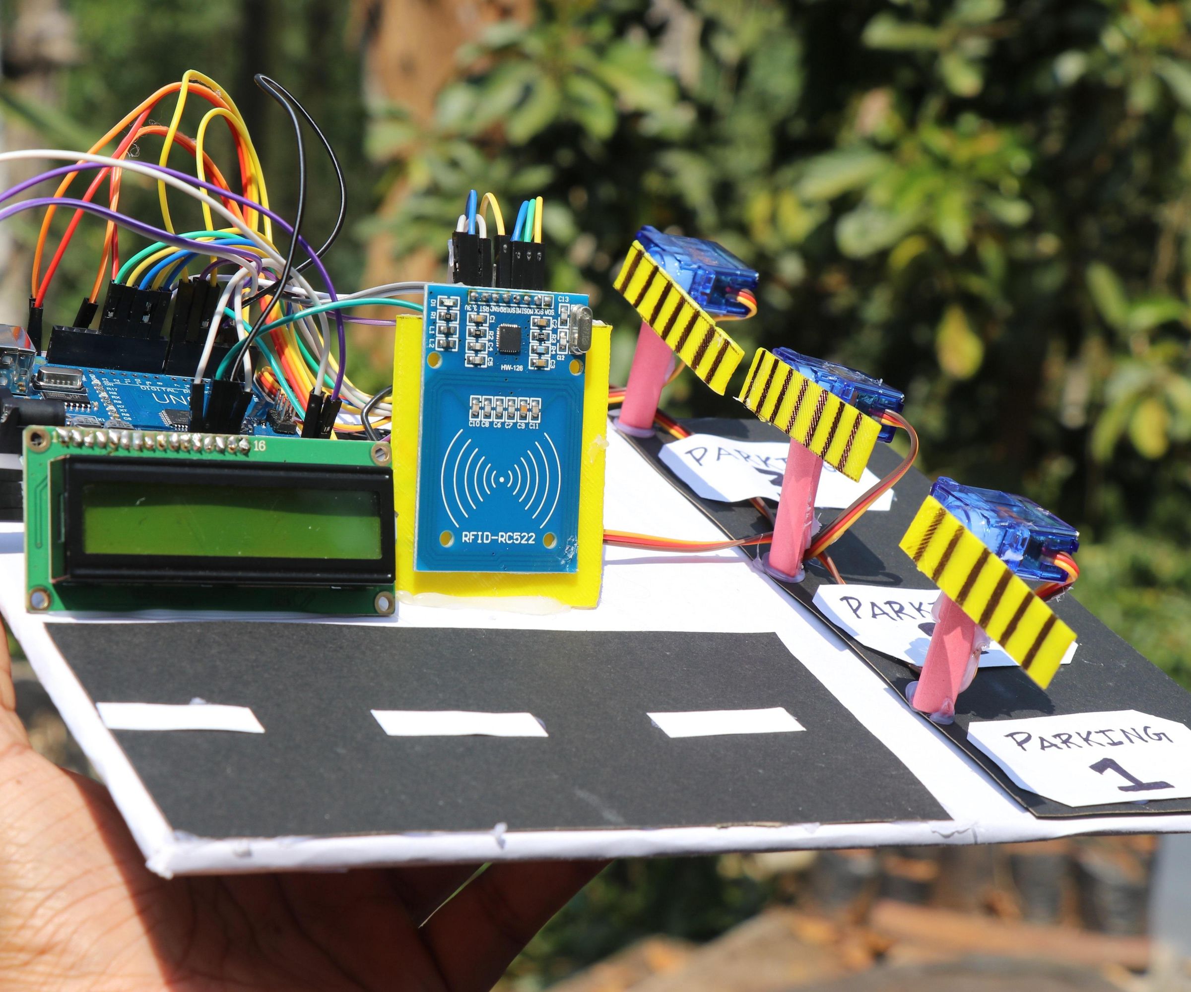Arduino and RFID Based Smart Parking System
