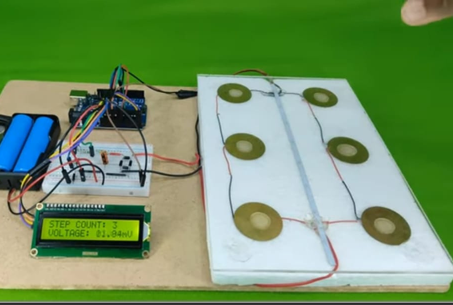 Smart Footstep Power Generator Using Piezoelectric Sensors & Arduino